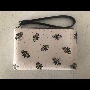 Coach bee pattern pouch authentic and brand new